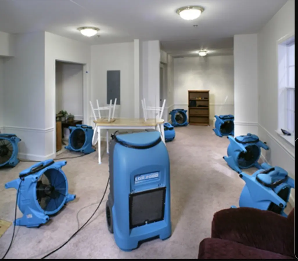 Air movers and dehumidifier setup for Water Damage Restoration in Del Aire